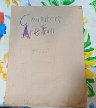 Computers Are Fun cover. Faded blue construction paper with the words 'Computers Are Fun' written in crayon. A pencil drawing of a computer monitor displaying 'WILLIAM' and a cursor is faintly visible.
