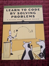 Cover of learn to code by solving problems, which shows a robot teaching cows about physics