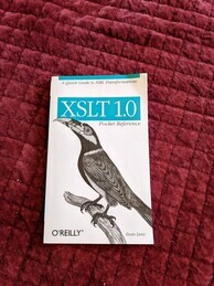 Cover of the XSLT 1.0 Pocket Reference O'Reilly book. Features an image of a spot-billed toucanet